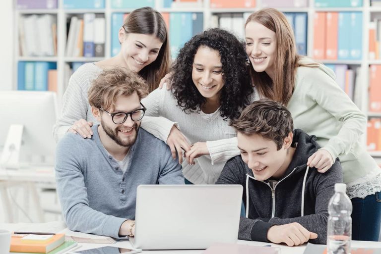 group-of-students-connecting-with-a-laptop